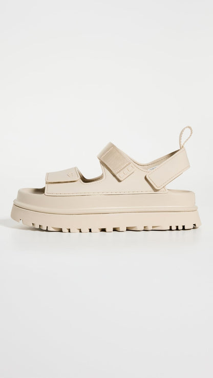 UGG Women's GOLDENGLOW Flat Sandal, SEA Salt, 8