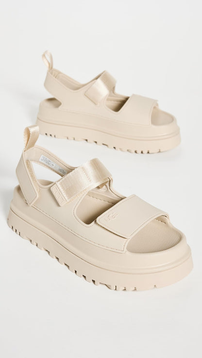 UGG Women's GOLDENGLOW Flat Sandal, SEA Salt, 8