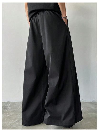 OYOANGLE Men's Baggy Wide Leg Pants Zipper Fly Pleated Trousers Business Casual Dress Pants with Pocket Black X-Large